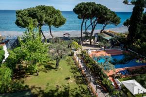 an aerial view of a resort with the ocean in the background at Hotel Eden Park in Diano Marina