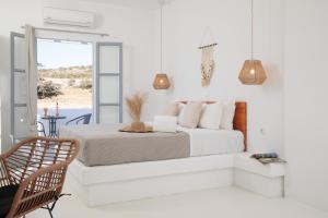 Postel nebo postele na pokoji v ubytování Soley Naxos