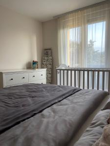 Postel nebo postele na pokoji v ubytování Epicentar apartment