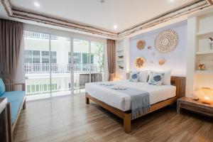 Arkbar Beach Club客房内的一张或多张床位