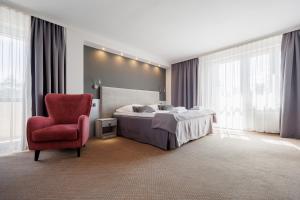 Ένα ή περισσότερα κρεβάτια σε δωμάτιο στο Hotel Cristal Park +131 φωτογραφίες