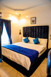 Katil atau katil-katil dalam bilik di El Elyon Hotel and Suites