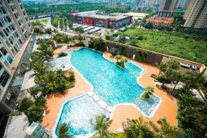 an aerial view of a swimming pool at a resort at Dcapitale - Feria Homes in Hanoi +92 photos
