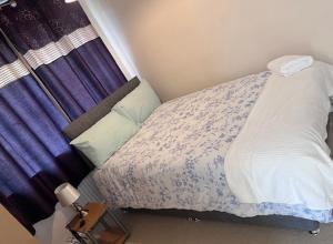 Postel nebo postele na pokoji v ubytování Newport Pagnell Guest House