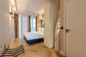 Postel nebo postele na pokoji v ubytování Midtown Hotel triple