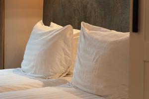 Postel nebo postele na pokoji v ubytování Midtown Hotel triple