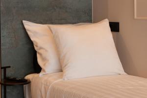 Postel nebo postele na pokoji v ubytování Midtown Hotel triple