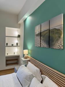 A bed or beds in a room at 1 BedRoom Apt - Live Like A Local In Kolonaki