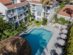 an overhead view of a swimming pool in a building at Kassandra Boutique Hotel in Oludeniz