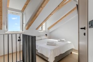 Posteľ alebo postele v izbe v ubytovaní Tiny Secret House
