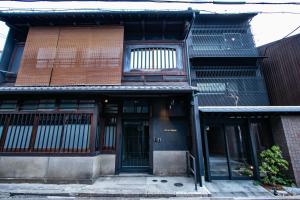 a building with a door in the front of it at Minn Nijo-jo in Kyoto