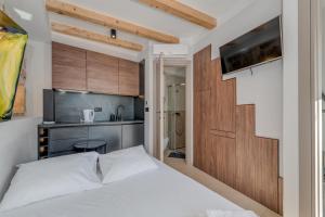 Posteľ alebo postele v izbe v ubytovaní Tiny Secret House