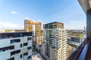 a view of a city with tall buildings at Pride Manor South Yarra in Melbourne