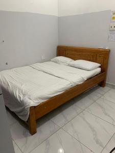 A bed or beds in a room at An Nam Corner- Cong Quynh