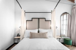 Hotel Casa Palacete Tablas客房内的一张或多张床位