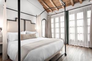 Hotel Casa Palacete Tablas客房内的一张或多张床位