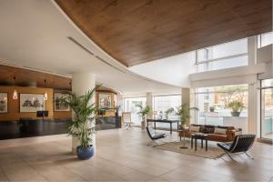 Ruang duduk di Precise House Mantegna Roma