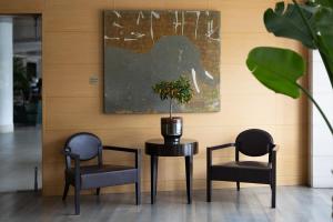 Ruang duduk di Precise House Mantegna Roma