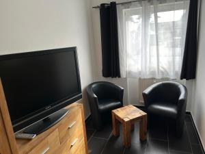 TV a/nebo společenská místnost v ubytování Fewo Spengler