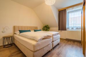 Postel nebo postele na pokoji v ubytování Apartmán Solaris