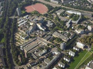 an overhead view of a city with buildings and trees at FanHostel European Championship 24 Cologne City Center in Cologne