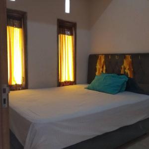 Katil atau katil-katil dalam bilik di Adventura House