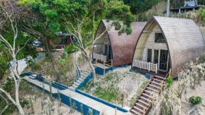 an overhead view of a house on the beach at Karuna El Nido Villas in El Nido