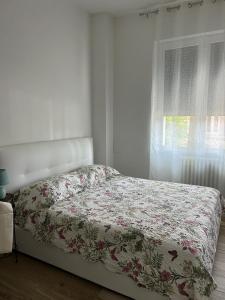 A bed or beds in a room at BeB via Sardegna