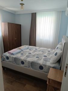 Postel nebo postele na pokoji v ubytování Mihenk Pansiyon