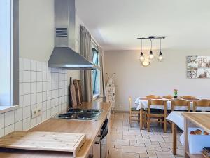 Kuchyň nebo kuchyňský kout v ubytování De Eikhoeve - Alveringem