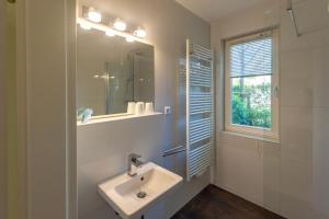 Ein Badezimmer in der Unterkunft Wohnpark Stadt Hamburg - Apt. 14