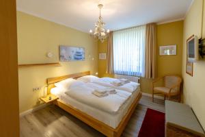 Ein Bett oder Betten in einem Zimmer der Unterkunft Wohnpark Stadt Hamburg - Apt. 14