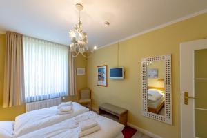 Ein Bett oder Betten in einem Zimmer der Unterkunft Wohnpark Stadt Hamburg - Apt. 14
