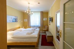 Ein Bett oder Betten in einem Zimmer der Unterkunft Wohnpark Stadt Hamburg - Apt. 14