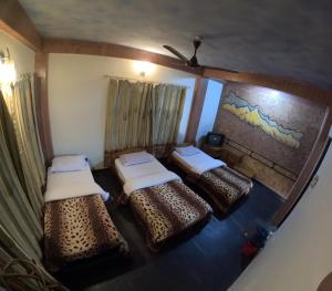 A bed or beds in a room at Hotel Hakoniwa