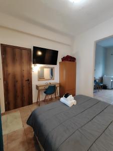 Poseidon Rooms客房内的一张或多张床位