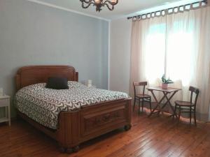 Postel nebo postele na pokoji v ubytování B&B Rocciamelone