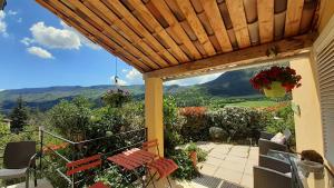 a view from the porch of a house at Les Terrasses du Paradis in Orpierre