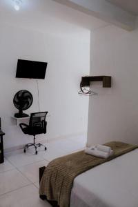 TV a/nebo společenská místnost v ubytování ORHO AIRPORT PANAMA
