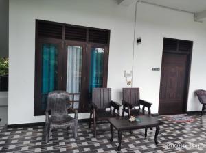 Posezení v ubytování The Lake View Tangalle