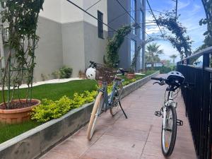 two bikes parked next to each other on a sidewalk at Ulu Panorama Residence in Alanya