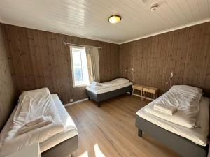 Postel nebo postele na pokoji v ubytování Lofoten Panorama
