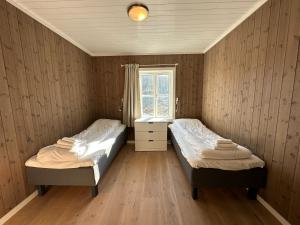 Postel nebo postele na pokoji v ubytování Lofoten Panorama