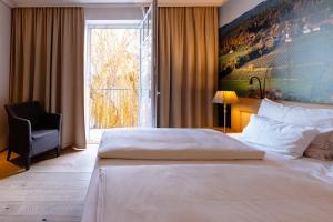 Voodi või voodid majutusasutuse Hotel Stainzerhof toas