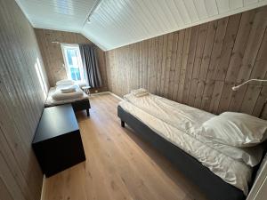 Postel nebo postele na pokoji v ubytování Lofoten Panorama