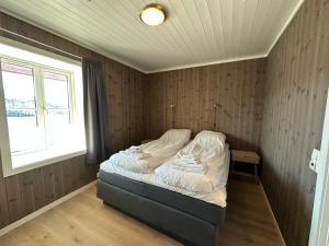 Postel nebo postele na pokoji v ubytování Lofoten Panorama