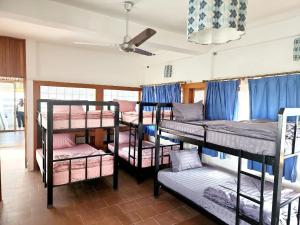 a group of bunk beds in a room at CHILCHILL Elite Residences BKK2 in Phnom Penh