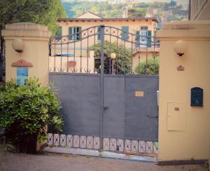 a large black gate in front of a building at Le Residenze dei Serravallo in Trieste