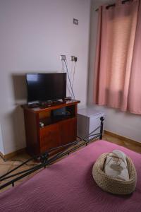 TV a/nebo společenská místnost v ubytování Funtana'e Mari + 37 fotografií