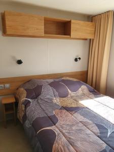 Posteľ alebo postele v izbe v ubytovaní Camping du Bois Dormant + 19 fotografií